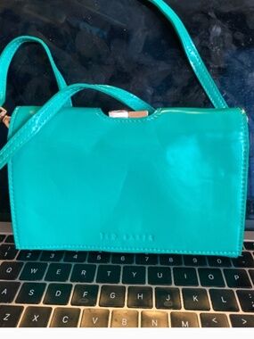 TED BAKER patent leather wallet wirh strap.